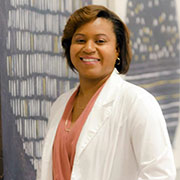 Garden of Alice customer Janet smiling and looking very happy